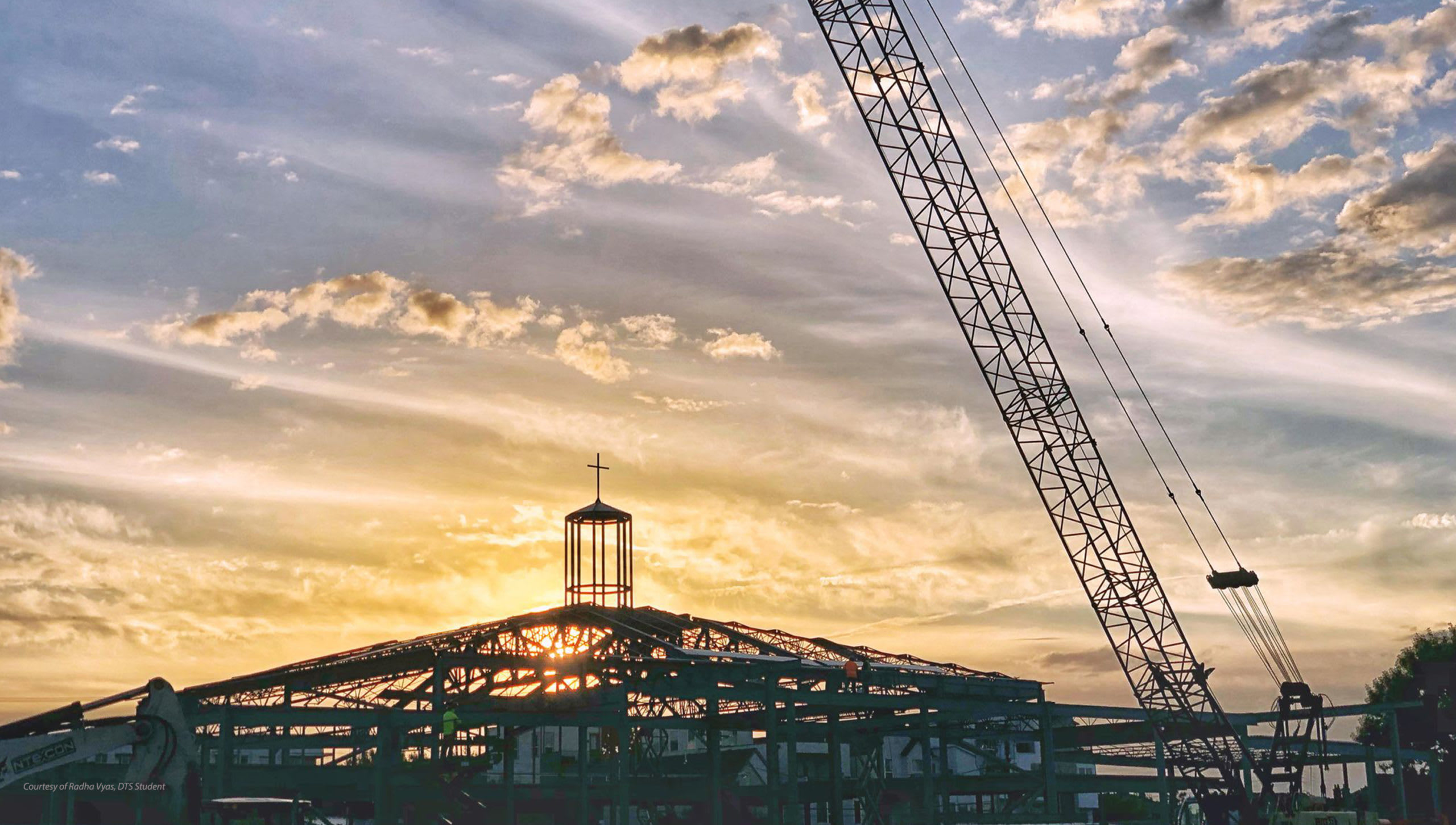 chapel under construction at sunset